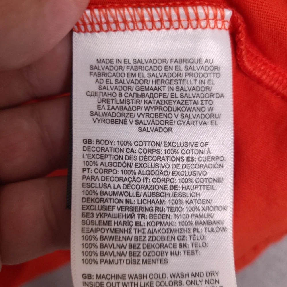 The North Face T-Shirt Mens Small Orange Circular Design Long Sleeve Graphic‎